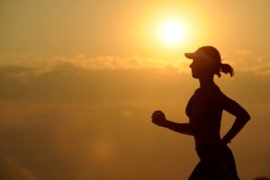 Woman running in the sun telomeres and exercise