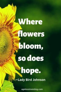 A Sunflower against a green background, quote "Where flowers bloom, so does hope." -Lady Bird Johnson