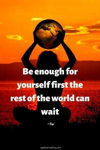 A picture of a woman sitting holding a globe over her head in the sunset, quote "Be enough for yourself first the rest of the world can wait"