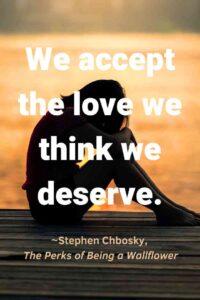 A Silhouette of a Sad Girl Sitting by the Pier, with the text overlay: “We accept the love we think we deserve.” ~Stephen Chbosky, The Perks of Being a Wallflower