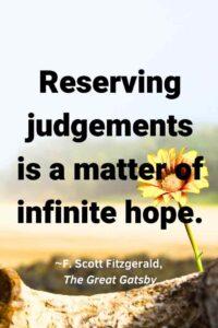 An image of a yellow flower growing in a desolate landscape, with the text overlay: “Reserving judgements is a matter of infinite hope.” ~F. Scott Fitzgerald, The Great Gatsby